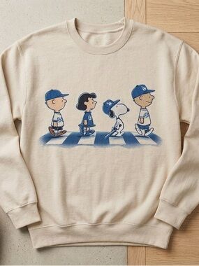 Cream Sweatshirt with Blue Peanuts Baseball Graphic